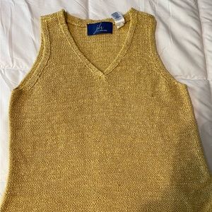 yellow sweater vest